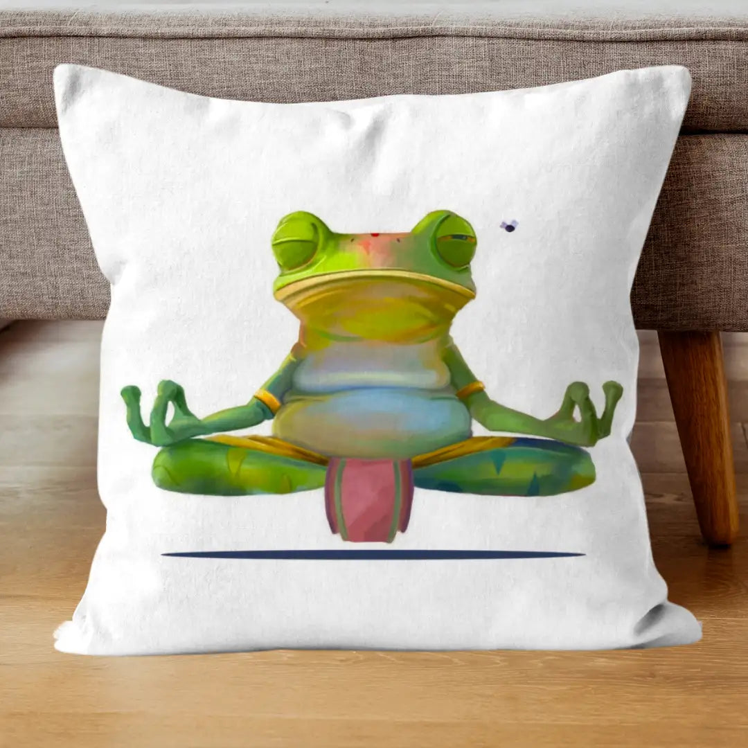 Meditating frog cushion propped against a textured brown sofa, highlighting its soothing design in a neutral-toned living room.